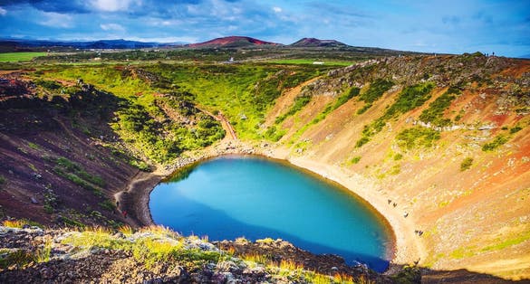 photo of kerid crater volcanic lake  of Iceland. Scenic landscape at sunset.