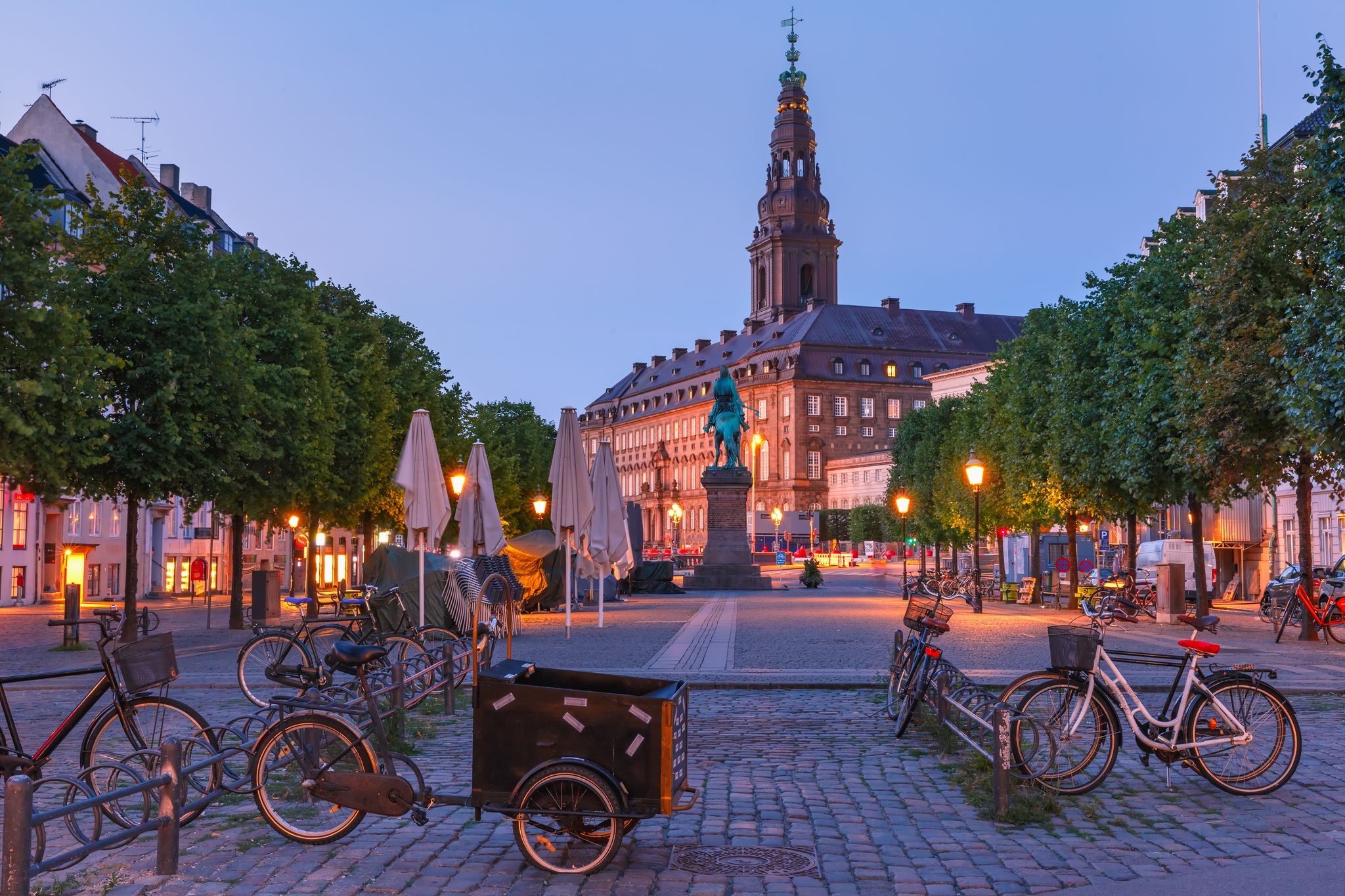 Photo of Christiansborg Palace during morning blue hour, Copenhagen, capital of Denmark.
