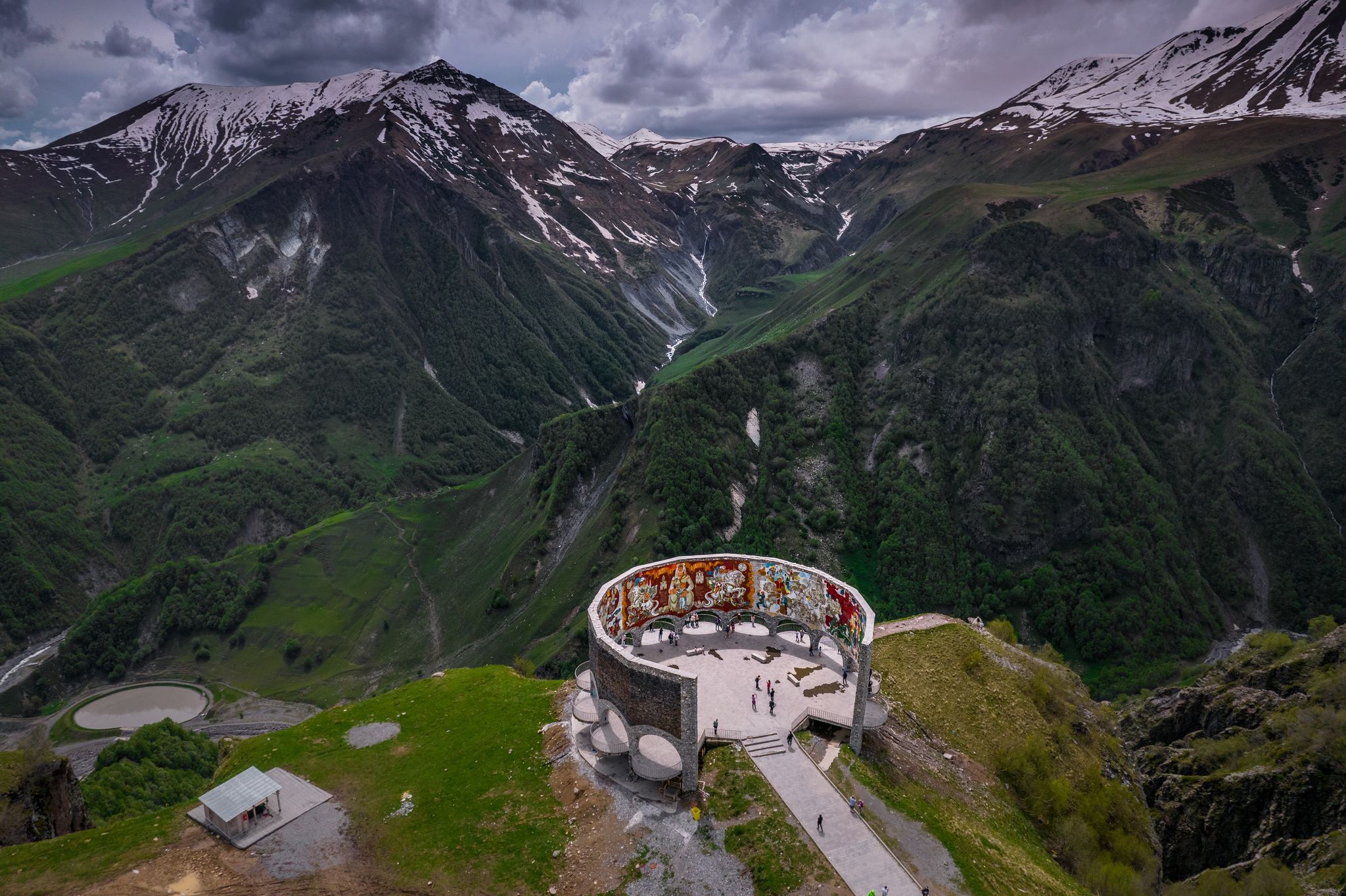 Photo of aerial view of friendship Monument on the Georgian military road at the Jvari pass, Georgia.