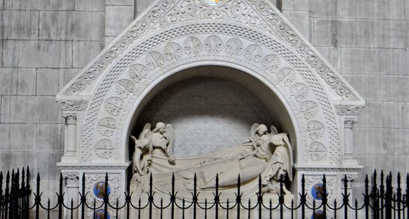 Tomb of Jean-Baptiste-Amédée George de La Massonnais . The bishop's recumbent figure was sculpted in 1863 by Michel-Pascal .