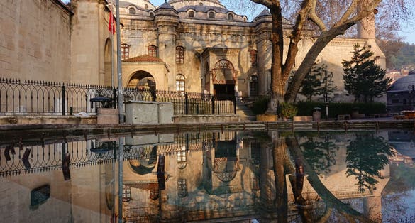 photo of view of Ulucami mosque and the reflection - Kütahya, Turkey.