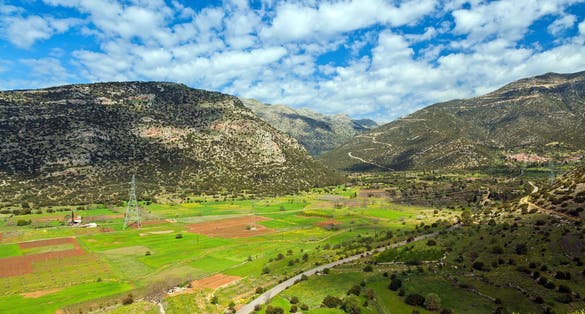 Photo of Plateau of Nestani, a wide agricultural area surrounded by low hills near Tripoli town, in the region of Arcadia, in Peloponnese, Greece, Europe.