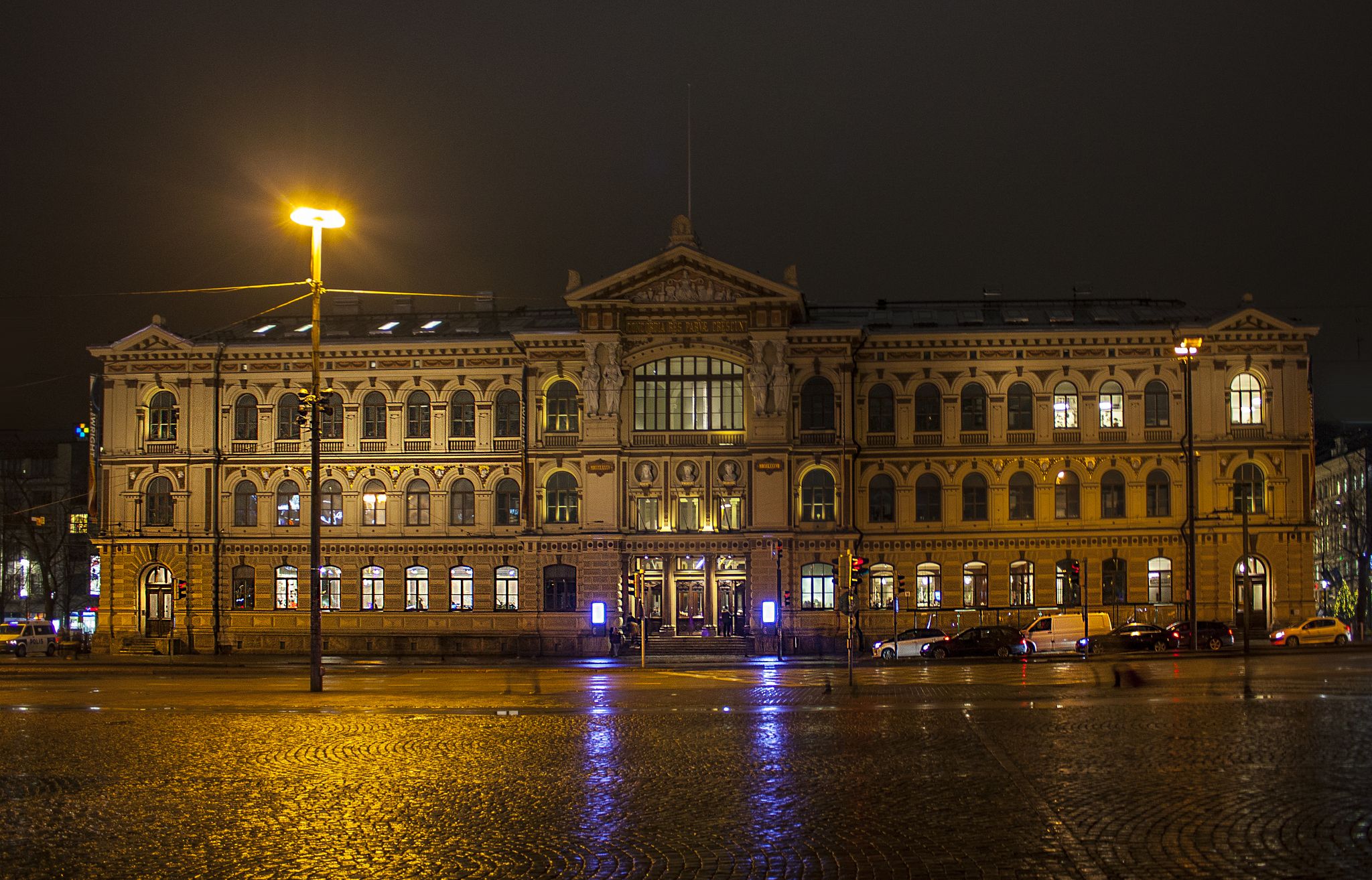 Photo of famous Ateneum art museum at night in Helsinki, Finland.