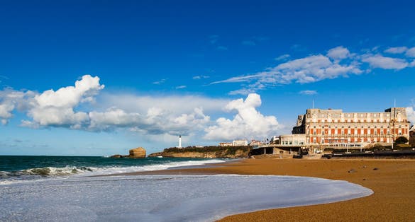 Photo of the Grande Plage from Biarritz. Famous Hotel du Palais in the background, France.