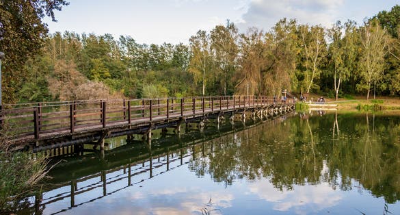An old wooden bridge at Lake Gebart (Gebarti-to) in Zalaegerszeg, Hungary