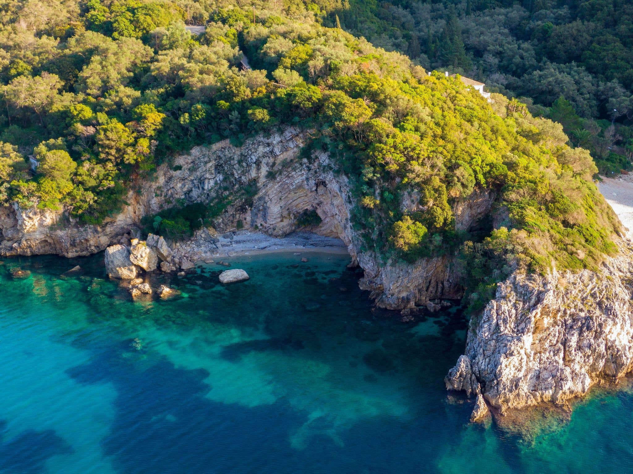Aerial drone view of Rovinia Beach in liapades, Corfu, Greece