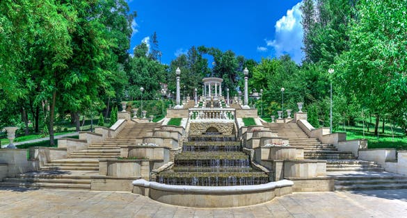 photo of Chisinau, Moldova – 06.28.2019. Fountains and the cascading stairs near the valea morilor lake in Chisinau, Moldova, on a sunny summer day.