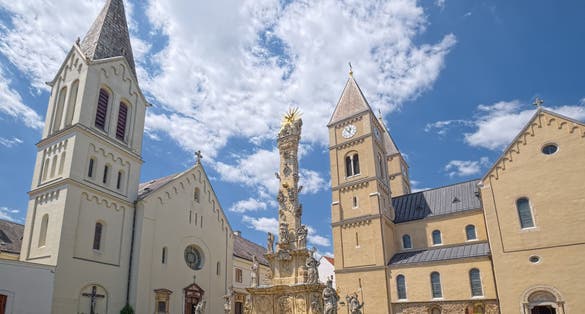 Saint Michael Cathedral, Holy Trinity Column and Franciscan Church, historic buildings and the most prominent landmarks in the Castle of Veszprem town, Hungary.