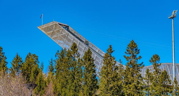Photo of Holmenkollen ski jumping stadium and norwegian ski museum in Oslo, Norway.