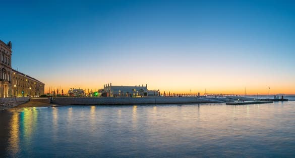 Cais das Colunas pier panorama at sunrise in Lisbon. Portugal