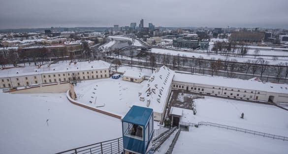 Winter view of the Lithuanian National Museum and the Museum of Applied Art with Neris river and Vilnius downtown in the background, as seen from Gediminas Tower hill, Vilnius, Lithuania