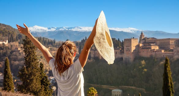 Photo of happy woman travel in Spain, Andalousia, Granada, Alhambra.