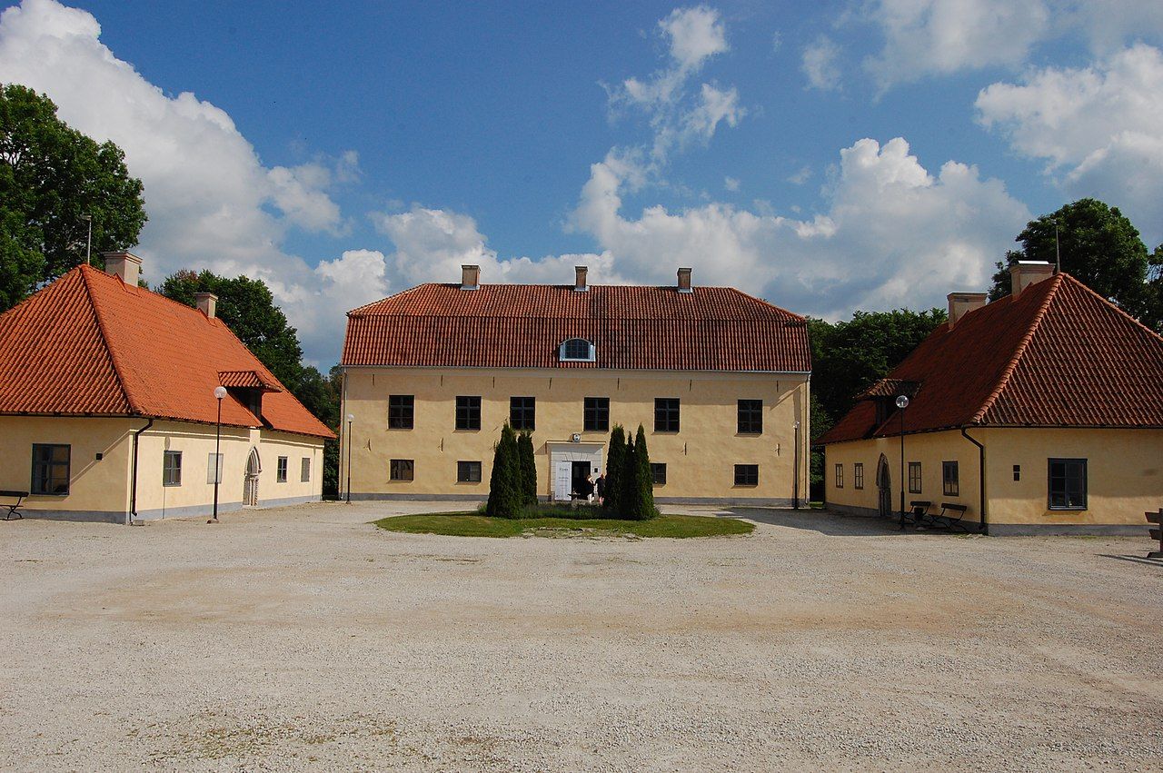 photo of the front courtyard of the crown estate manor in Roma Abbey, Gotland, Sweden.