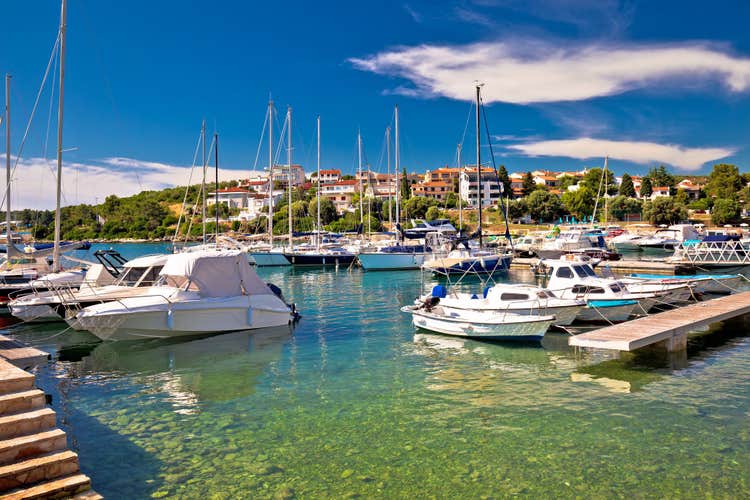 Photo of Pjescana Uvala harbor and turquoise coast view near Pula, Istria region of Croatia.
