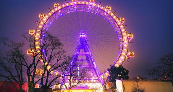 Photo of lighting Ferris wheel in the night, Vienna Prater, Wiener Riesenrad an amusement park in Austria