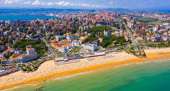 photo  of view  of  Day aerial cityscape of Santander coast with sand beach, Cantabria, Spain