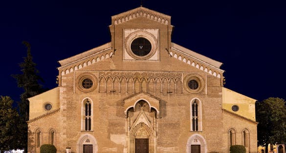 The catholic Cathedral of Santa Maria Annunziata in Udine on the Piazza Duomo in Night Light. The Church was consecrated in 1335.
