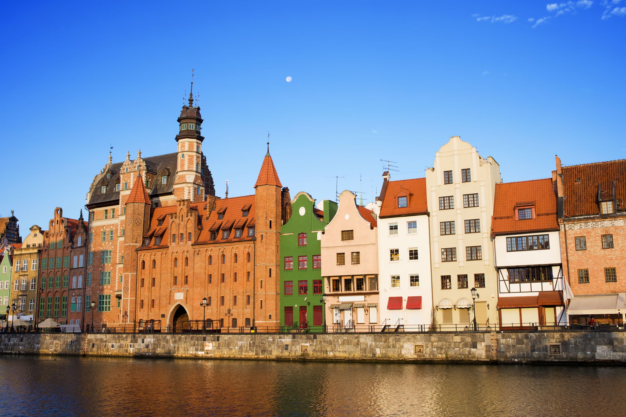 Old Town in city of Gdansk in Poland, Motlawa river, Straganiarska Gate on the left.