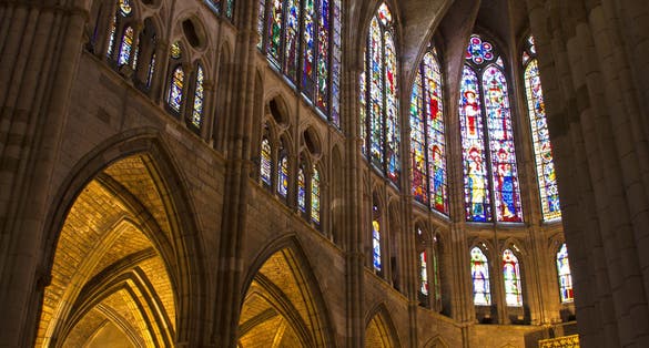 photo of high altar and stained glass windows in the cathedral of Leon, Spain.