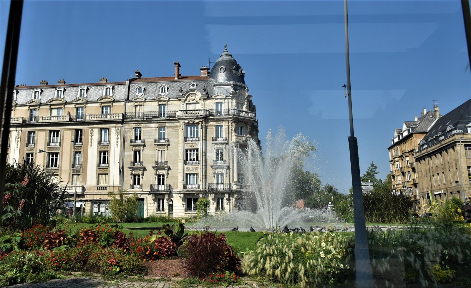 Photo of Metz city view of Petit Saulcy an Temple Neuf and Moselle River in Summer, France.