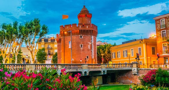 Photo of Castillet tower hosting a museum of history and culture in Perpignan, France.