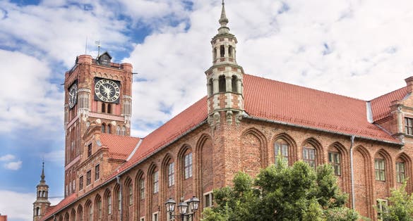 Photo of Gothic building of a medieval City Hall in Torun, Poland.