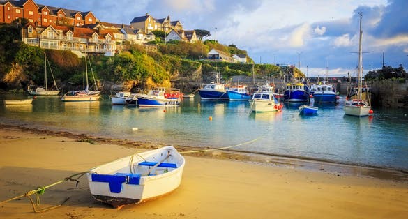 Photo of fishing boats in the harbour at Newquay on the Cornwall coast.