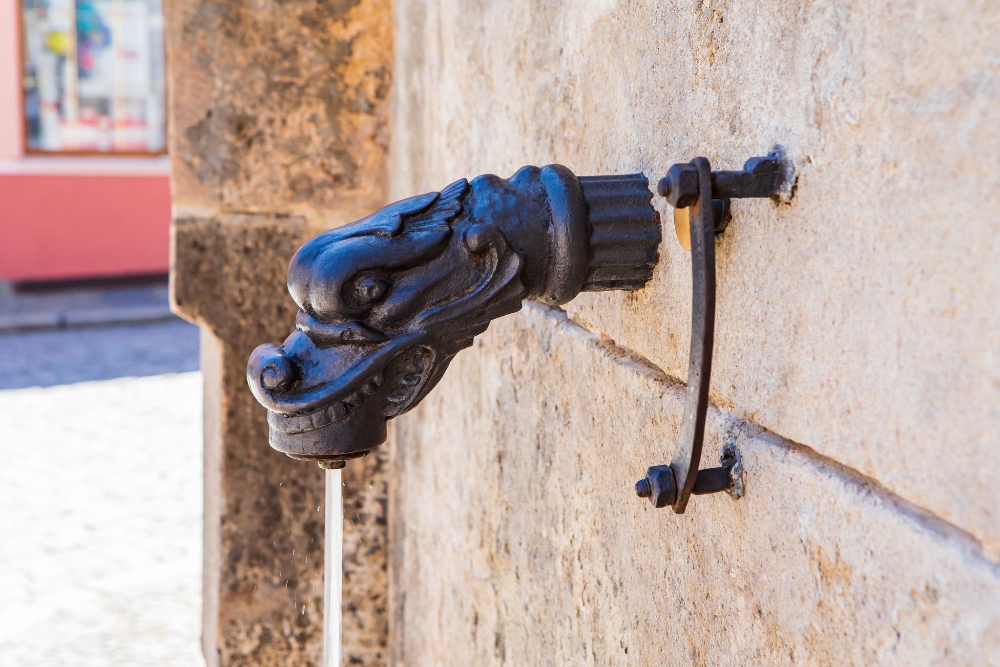 Photo of water tap of gothic stone fountain in Kutna Hora, a town in the Central Bohemian Region of the Czech Republic.