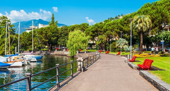 Photo of waterfront promenade in Locarno. Locarno is a town located on the shore of Lake Maggiore in the Ticino canton in Switzerland.