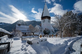 Photo of church of Saanen in winter time, Switzerland.