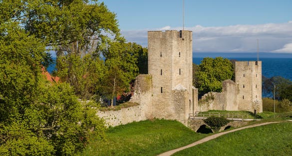 photo of Visby medieval city wall during sunrise on the island Gotland in Sweden.