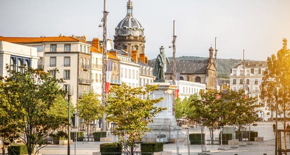 Photo of View on the Jaude square during the morning light in Clermont-Ferrand city in central France.
