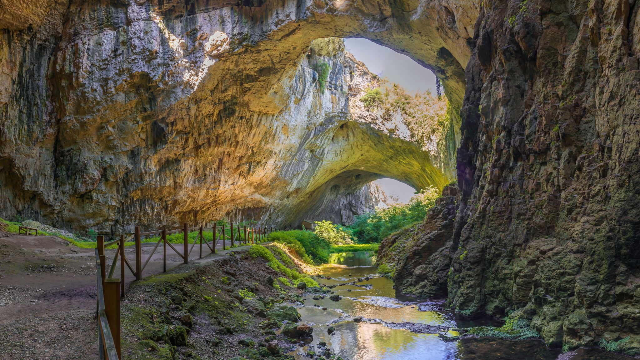 Photo of panoramic view inside the Devetashka Cave near Devetaki village and Osam river in Bulgaria.