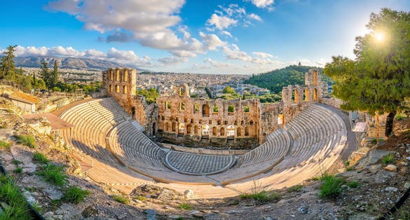 Photo of the Odeon of Herodes Atticus Roman theater structure at the Acropolis of Athens, Greece.