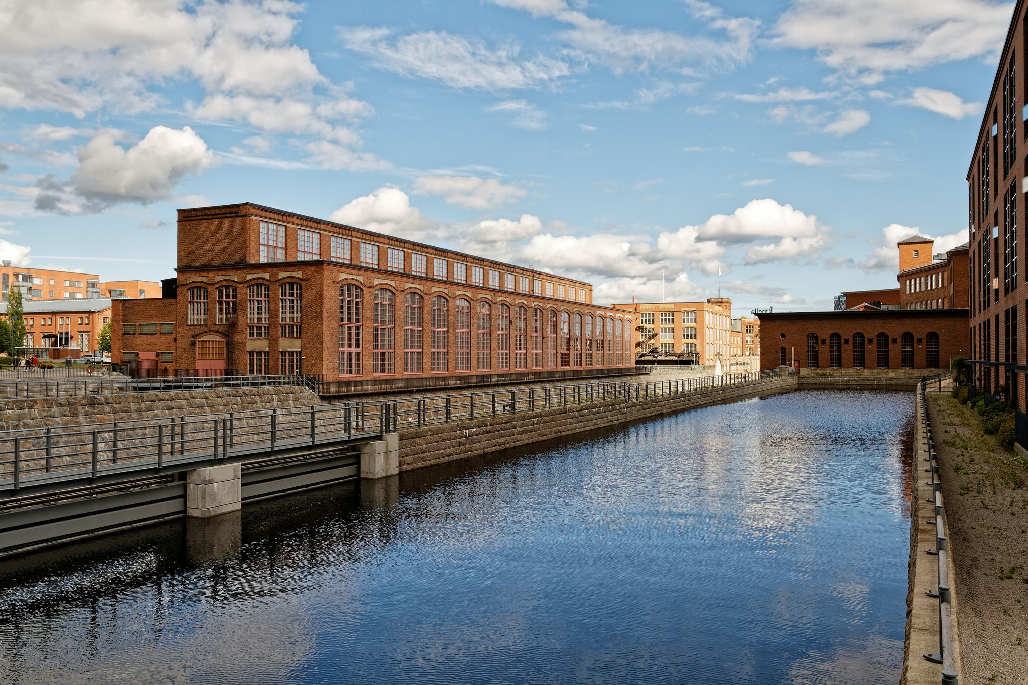 Photo of Vapriikki on the left is a museum centre in Tampere which hosts many exhibitions, Tampere, Finland.