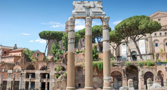 PHOTO OF The 3 columns Corinthian order of the temple of Castor and Pollux (Tempio dei Dioscuri) is an ancient edifice in the Roman Forum, Rome, Italy.