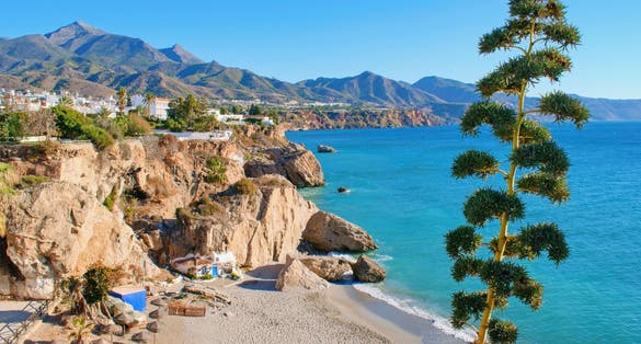 Photo of tourist spaces in the town of Nerja, Málaga, one of the white villages of Andalusia, Spain, Calahonda beautiful beach.