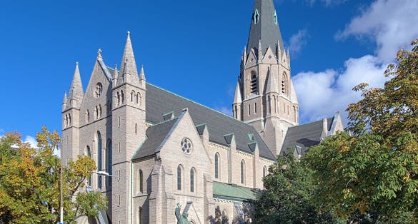 photo of Olaus Petri Church with monument to the brothers Olaus and Laurentius Petri in Orebro, Sweden.