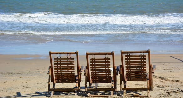 Photo of Almada beautiful beach on a sunny day, Portugal.