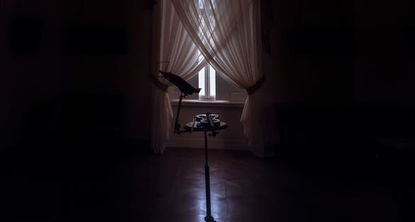 Photo of Old music room with a violin and music stand in the center, Horovice castle interior, Czech Republic.