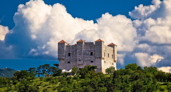 Photo of Nehaj fortres in Senj on green hill, Primorje region of Croatia.