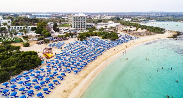 Photo of aerial bird's eye view of famous Makronissos beach coastline, Ayia Napa, Famagusta, Cyprus.