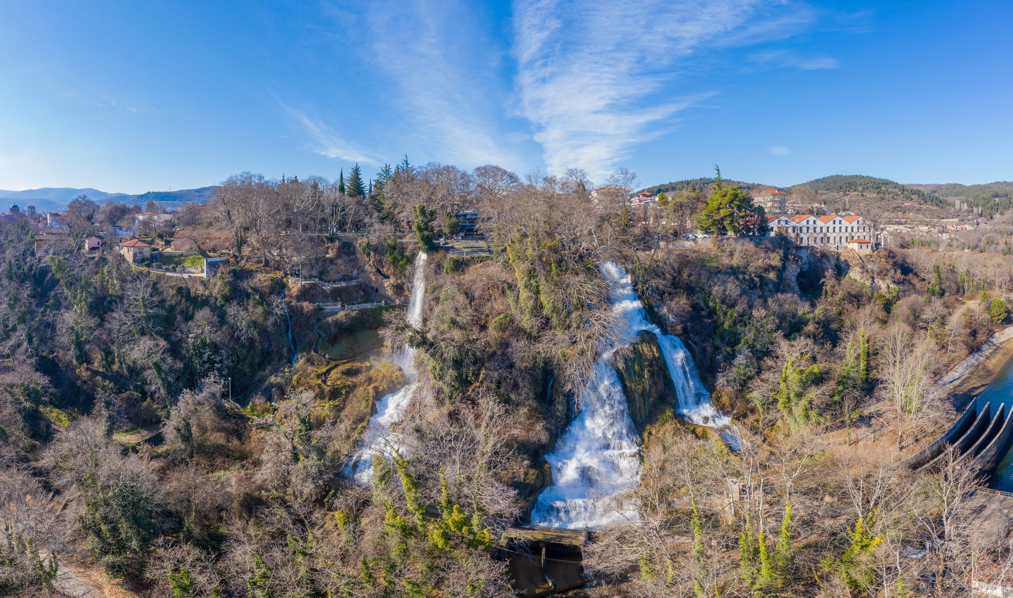Photo of aerial panoramic view of the powerful waterfalls of Edessa and the surrounded area in Edessa city, Greece.