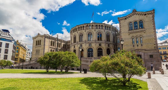 photo of view of Oslo parliament in Norway in Oslo in a summer day