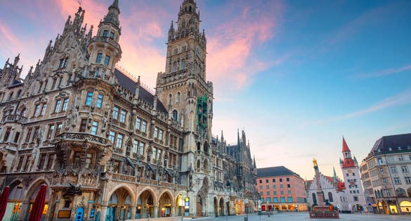 Photo of cityscape image of Marien Square in Munich, Germany during twilight blue hour.