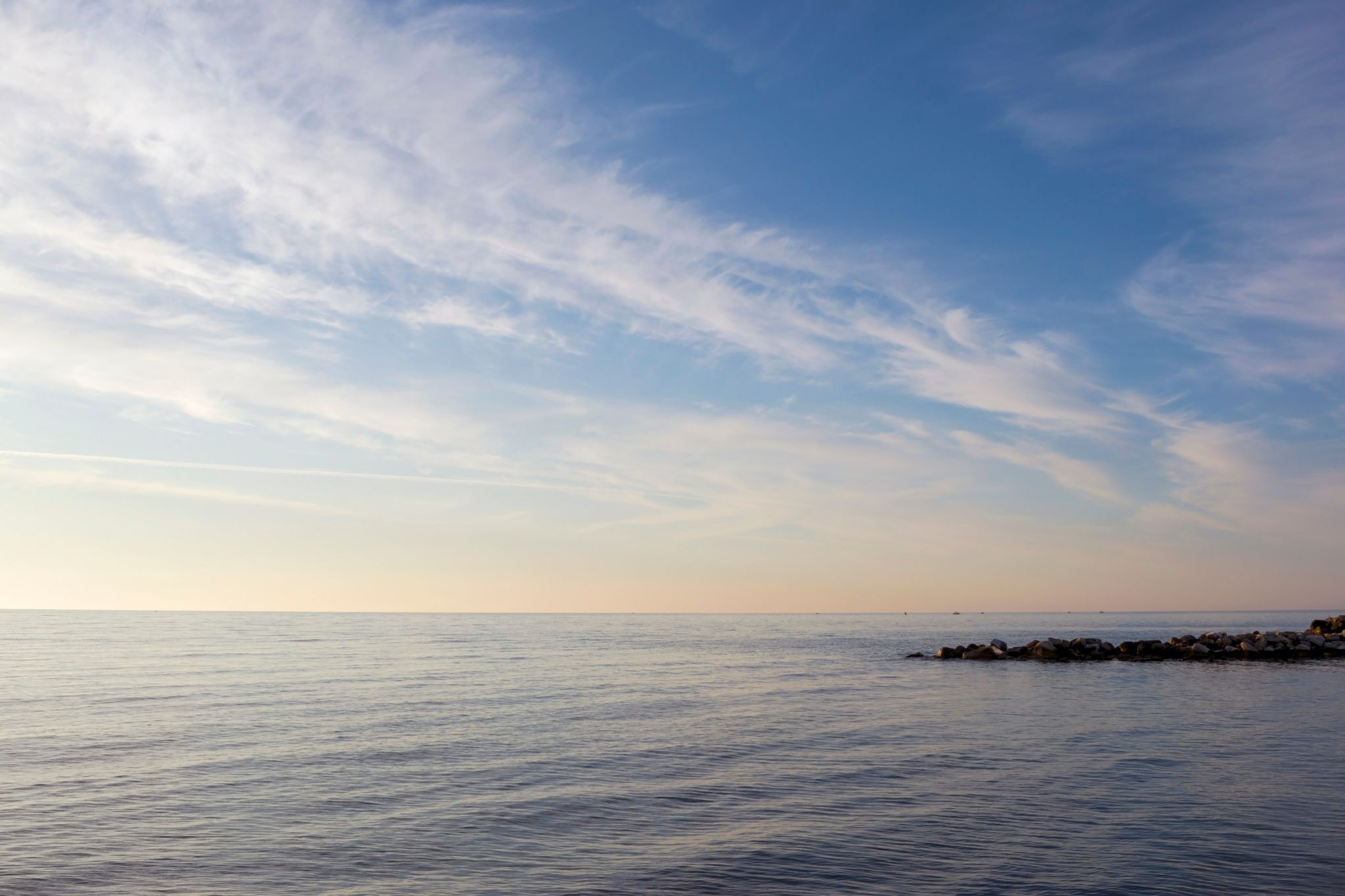 Photo of beautiful pacific sunset on the beach of Katerini in Greece.