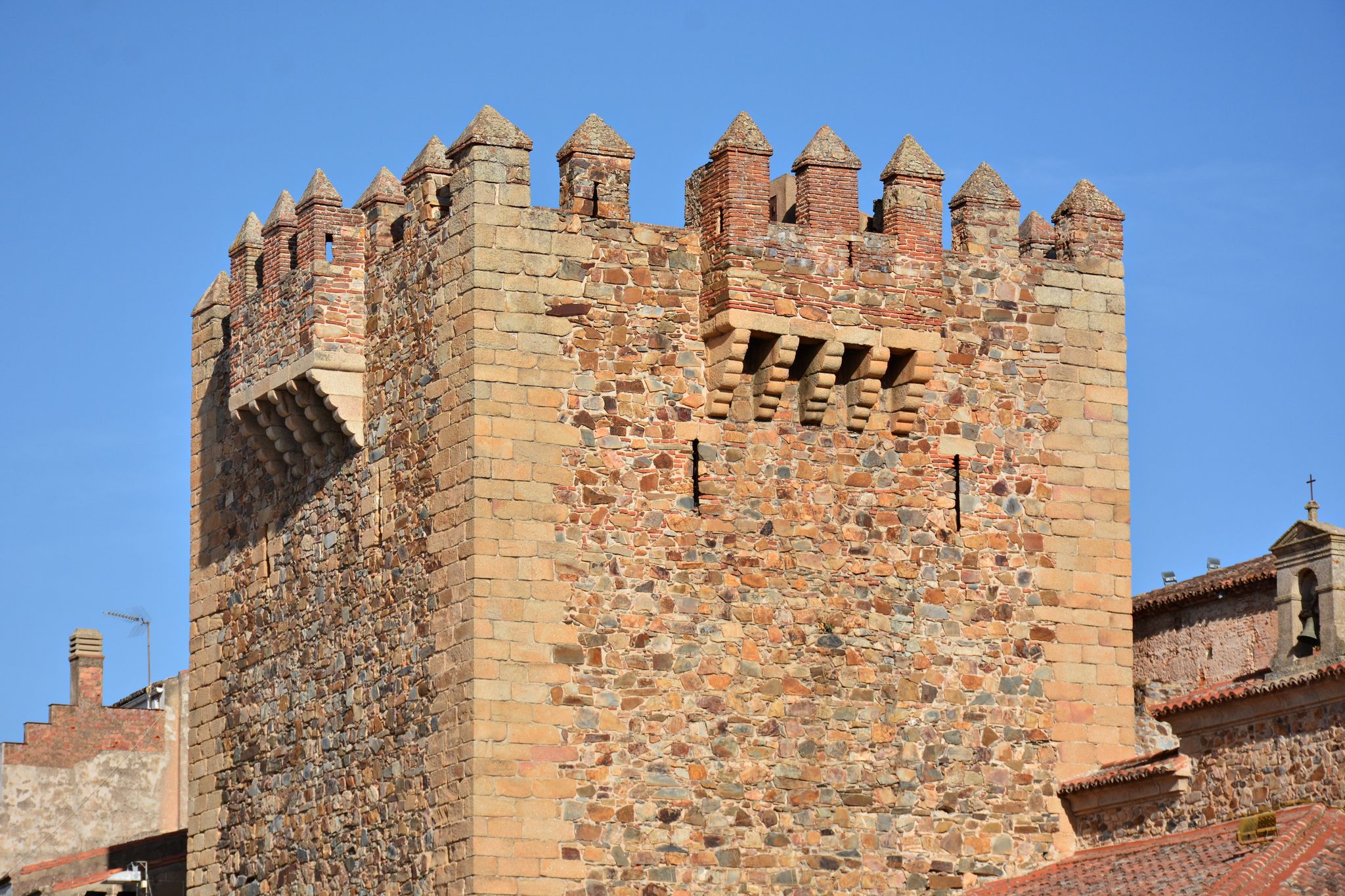 Photo of Detail of the Torre de Bujaco in the Plaza Mayor of Cáceres, Spain.