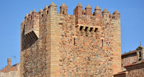 Photo of Detail of the Torre de Bujaco in the Plaza Mayor of Cáceres, Spain.