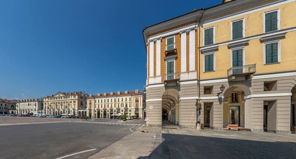 photo of Cuneo, Piedmont, Italy - Piazza Tancredi Duccio GalimbertI, main square of Cuneo with historic neoclassical buildings, as seen from Via Roma.