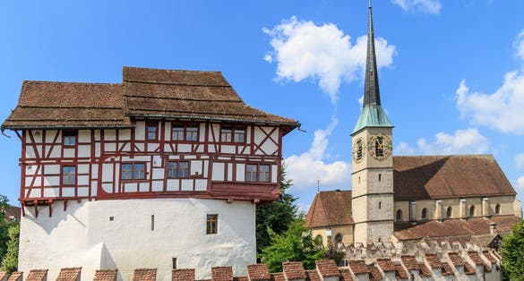 photo of Zug Castle and St. Oswald Church in the city of Zug, Switzerland.